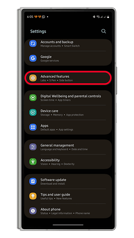 Settings menu on a smartphone displaying options, including 'Advanced features' highlighted.