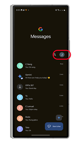 Google Messages app interface showing recent chats and a search icon.