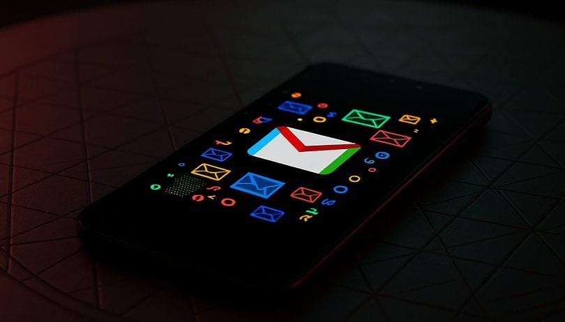 Gmail Adds a Genius Feature That Keeps Track of Your Packages Gmail logo on a smartphone highlight tracking package feature
