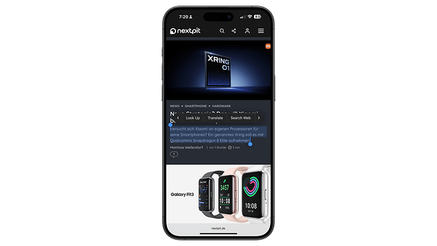 Mobile phone displaying a web page with news and a Google Translate feature.