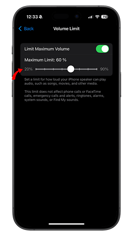 Écran d'iPhone affichant les paramètres de limite de volume avec un curseur et des options de volume maximum.
