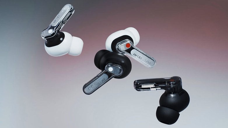 Three pairs of Nothing Ear 3 wireless earbuds in black and white colors against a gradient background. Three pairs of Nothing Ear 3 wireless earbuds in black and white colors against a gradient background.