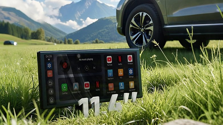 Ottocast display on grass with 11.4-inch screen, showing app icons, beside a car in a mountainous landscape. Ottocast display on grass with 11.4-inch screen, showing app icons, beside a car in a mountainous landscape.