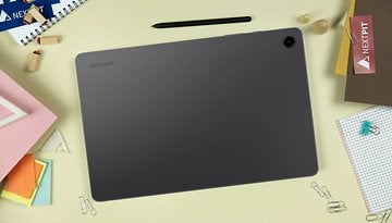 Samsung Galaxy Tab A9+ with a stylus pen on the table.