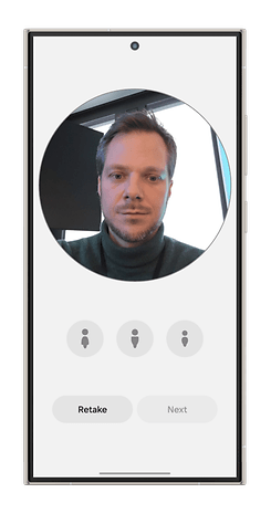 Un écran de smartphone affichant un selfie avec des options pour refaire ou continuer.