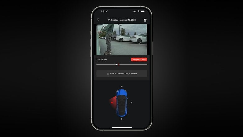 A smartphone displaying the Tesla app with a video clip and vehicle overview.