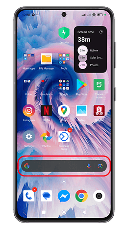 Android smartphone home screen with various app icons and a Google search bar.