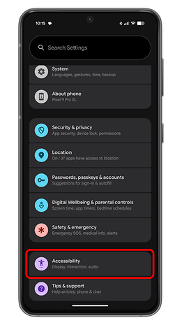 Settings menu of an Android device showing options like System, Security & privacy, and Accessibility.