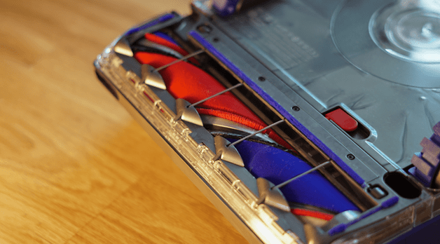 Close-up of the brush head of a Dyson 360 Vis Nav robot vacuum cleaner.