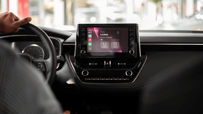 Car dashboard showing Nuki CarPlay interface with 'Locked' and 'Unlock' options.