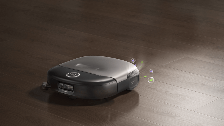 Ein eufy Omni S2 Roboterstaubsauger auf einem Holzboden, der Reinigungsblasen abgibt. Ein eufy Omni S2 Roboterstaubsauger auf einem Holzboden, der Reinigungsblasen abgibt.