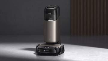 A Eufy Omni S2 robotic vacuum cleaner in a modern setting.