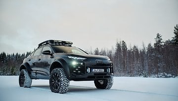 Audi Q6 e-tron offroad concept im Schnee.