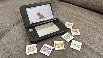 A Nintendo 3DS System and some game cartridges.