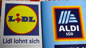 Logos von Lidl und Aldi, mit dem Text 'Lidl lohnt sich' und 'ALDI SÜD'.